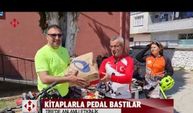 Bisikletçiler, heybelerindeki kitaplarla pedal bastılar