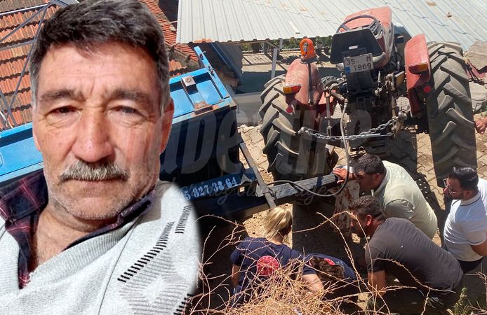 Devrilen traktörün altında can verdi